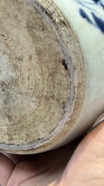 A Chinese blue and white 'Three Friends of Winter' jar with an openworked wooden cover, Transitional period