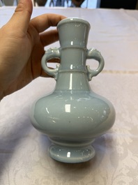 A Chinese claire-de-lune handled vase, with a wooden stand and its original hongmu box, Yongzheng mark, Republic