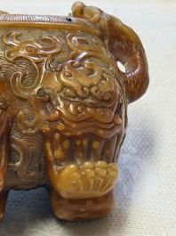 A Chinese precious-stone-inlaid carved soapstone wine vessel on stand, Gong 觥, Republic