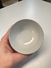 A pair of Chinese gilt-decorated sepia 'Riverscape' cups and saucers, Jiaqing