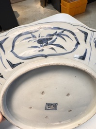 A rare Japanese Kutani oval 'Dutchmen' dish, seal mark, Edo, 17/18th C.