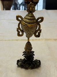 A Chinese parcel-gilt cloisonn&eacute; and bronze 'Conch Shell' Buddhist emblem, 18/19th C.