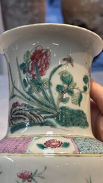 A pair of Chinese famille rose 'Pheasant among Flowering Branches' vases, 19th C.