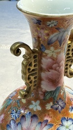 A pair of Chinese famille rose 'Millefleur' vases, Qianlong mark, Republic