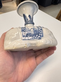 Two Chinese blue and white recumbent elephant-form candlesticks, Jiaqing