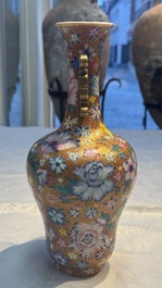 A pair of Chinese famille rose 'Millefleur' vases, Qianlong mark, Republic