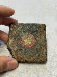 A gilt polychrome stucco votive plaque, Tsha Tsha, Tibet, 18/19th C.