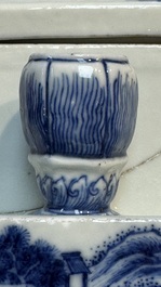 A rare Chinese blue and white 'Mountainous Landscape' writing set with an inkwell, sander and candlestick, Qianlong