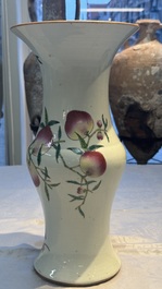 A Chinese famille rose 'Nine Peaches' 'Gu' vase, 19th C.