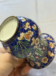 A Chinese Canton enamel 'Prunus on Cracked Ice' spittoon and two snuff dishes, 19th C.