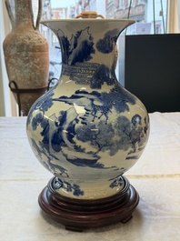A Chinese blue and white '100 Deers' 'Zun' vase on wooden stand, Kangxi mark, 19th C.