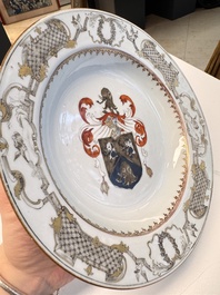 A pair of Chinese armorial soup plates with the arms of Saunders for the English market, Qianlong, ca. 1745