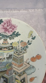 A Chinese qianjiang cai dish and a plate, two famille rose plates and a saucer, Chenghua, Yongzheng and Guangxu marks, 19th C.