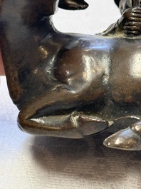 A Chinese bronze 'Boy and Buffalo' paperweight, Ming