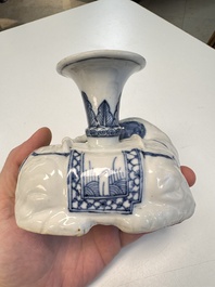 Two Chinese blue and white recumbent elephant-form candlesticks, Jiaqing