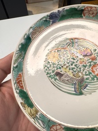 A pair of Chinese famille verte 'cranes' plates, Kangxi