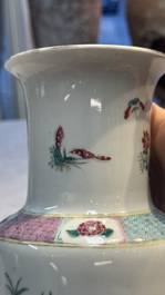 A pair of Chinese famille rose 'Pheasant among Flowering Branches' vases, 19th C.