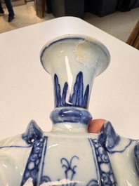 Two Chinese blue and white recumbent elephant-form candlesticks, Jiaqing