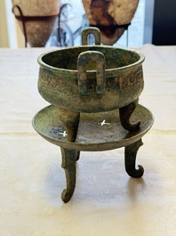 An inscribed Chinese archaic bronze food vessel and stand, You Pan Ding 有盤鼎, Western Zhou