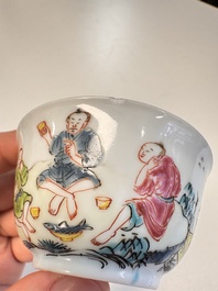 A Chinese famille rose 'Fishermen' cup and saucer, Yongzheng