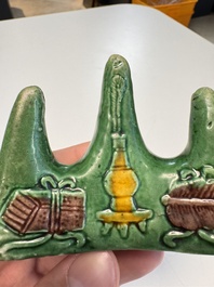 Three Chinese verte biscuit and turquoise-glazed brush rests, Kangxi and later