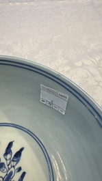 A Chinese blue and white 'Butterflies and Flowers' bowl, Transitional period