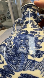 A Chinese blue and white moonflask vase with dragons, 'bianhu', Qianlong mark, Republic