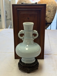 A Chinese claire-de-lune handled vase, with a wooden stand and its original hongmu box, Yongzheng mark, Republic