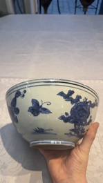 A Chinese blue and white 'Butterflies and Flowers' bowl, Transitional period