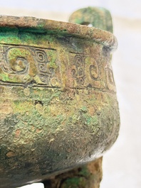 An inscribed Chinese archaic bronze food vessel and stand, You Pan Ding 有盤鼎, Western Zhou