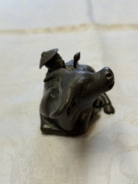 A Chinese bronze 'Boy and Buffalo' paperweight, Ming