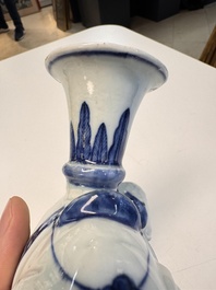Two Chinese blue and white recumbent elephant-form candlesticks, Jiaqing
