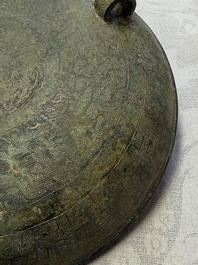 A Chinese archaic bronze tripod food vessel and cover, Ding 鼎, Eastern Zhou