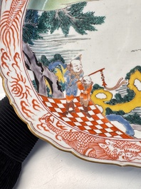 A rare Japanese Kutani oval 'Dutchmen' dish, seal mark, Edo, 17/18th C.