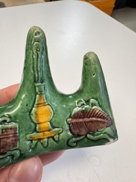 Three Chinese verte biscuit and turquoise-glazed brush rests, Kangxi and later