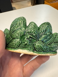 Three Chinese verte biscuit and turquoise-glazed brush rests, Kangxi and later