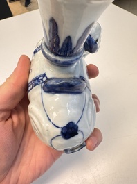 Two Chinese blue and white recumbent elephant-form candlesticks, Jiaqing