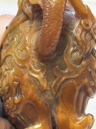 A Chinese precious-stone-inlaid carved soapstone wine vessel on stand, Gong 觥, Republic