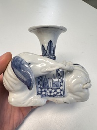 Two Chinese blue and white recumbent elephant-form candlesticks, Jiaqing