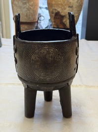 A Korean silver-inlaid iron 'He Lu Tong Chun 鶴鹿同春' tripod censer, Joseon, 18th C.