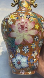 A pair of Chinese famille rose 'Millefleur' vases, Qianlong mark, Republic