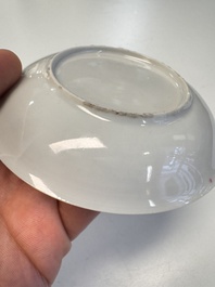 A Chinese famille rose 'Fishermen' cup and saucer, Yongzheng