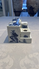 A rare Chinese blue and white 'Mountainous Landscape' writing set with an inkwell, sander and candlestick, Qianlong