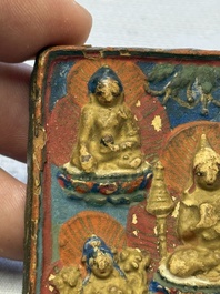 A gilt polychrome stucco votive plaque, Tsha Tsha, Tibet, 18/19th C.