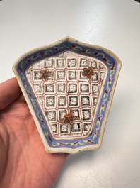 A Chinese famille rose nine-piece 'Plum Blossoms' sweetmeat set on a wooden tray, 19th C.