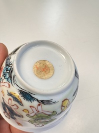 A Chinese famille rose 'Fishermen' cup and saucer, Yongzheng