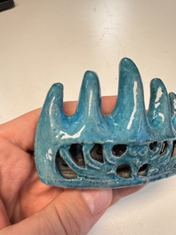 Three Chinese verte biscuit and turquoise-glazed brush rests, Kangxi and later