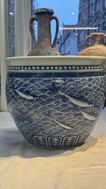 A Chinese blue and white 'Fish' scroll pot, 19th C.