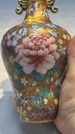 A pair of Chinese famille rose 'Millefleur' vases, Qianlong mark, Republic