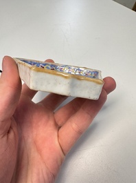 A Chinese famille rose nine-piece 'Plum Blossoms' sweetmeat set on a wooden tray, 19th C.
